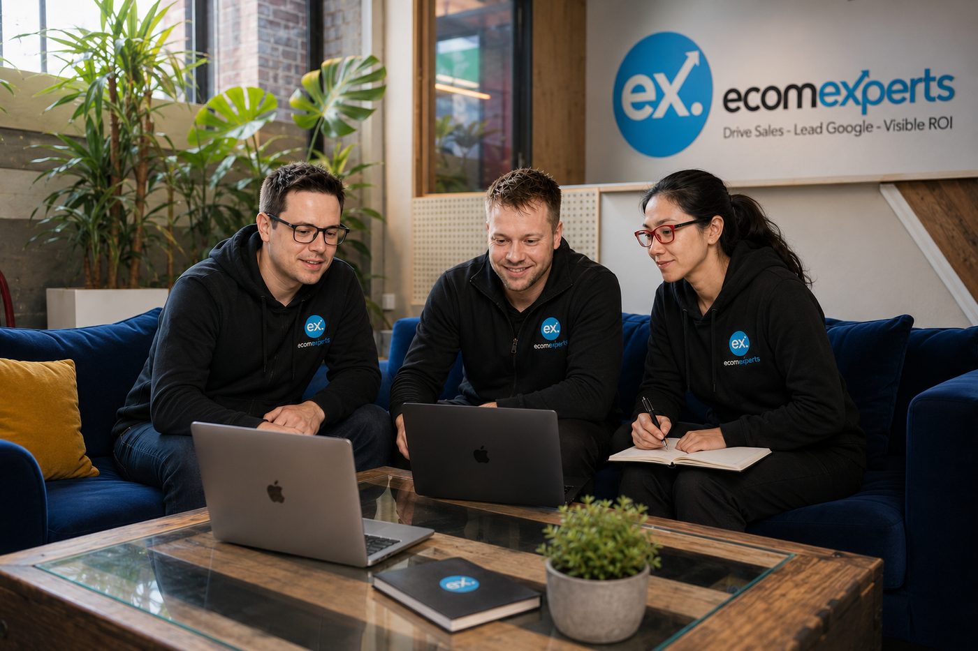 EcomExperts enterprise SEO team collaborating in the office